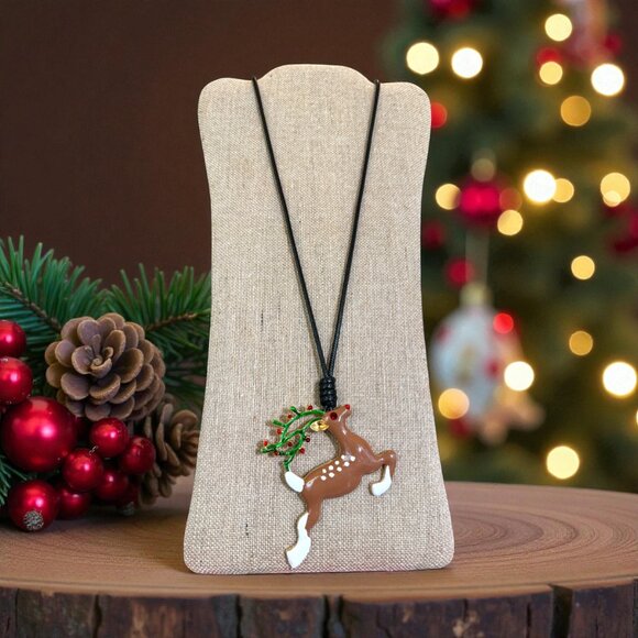 Jewelry - Large Reindeer pendant on a black cord necklace